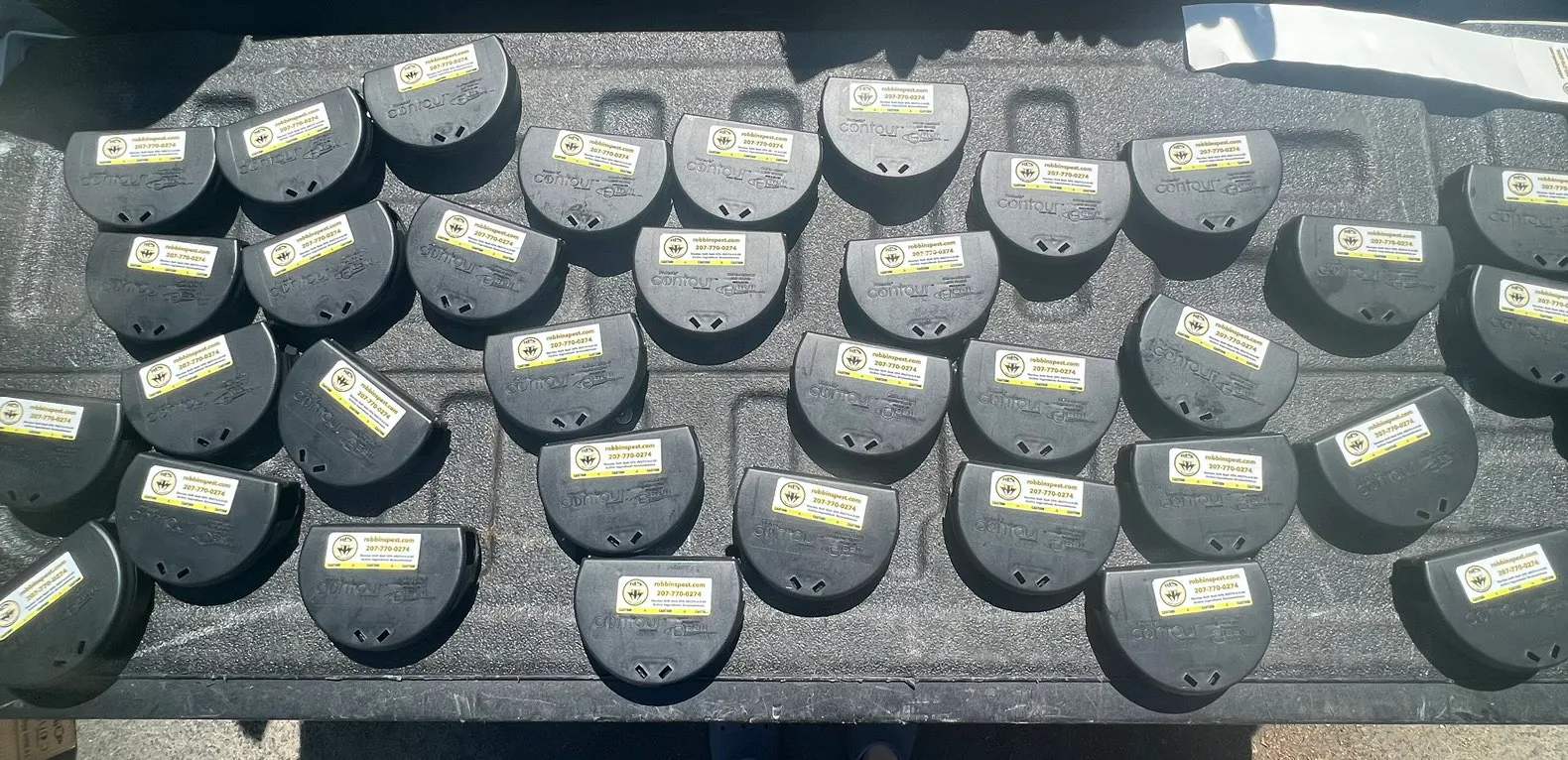 Professional rodent bait stations used for pest control in Portland Maine - tamper-resistant stations for safe rodent elimination